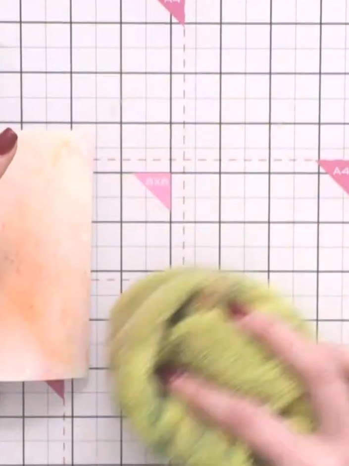 Step 4: Rinse your card under water to remove excess ink. Pat dry with kitchen roll. Repeat the process with orange in