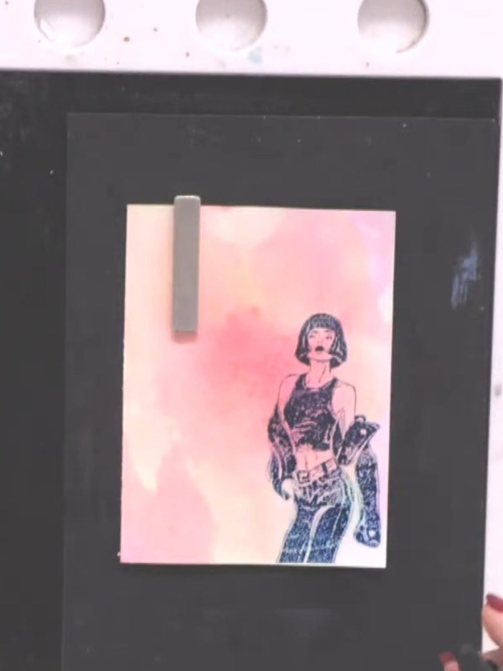 Step 7: Ink up your lady stamp with a dark teal or navy ink pad (such as Indigo or Ocean) and press firmly onto the dr