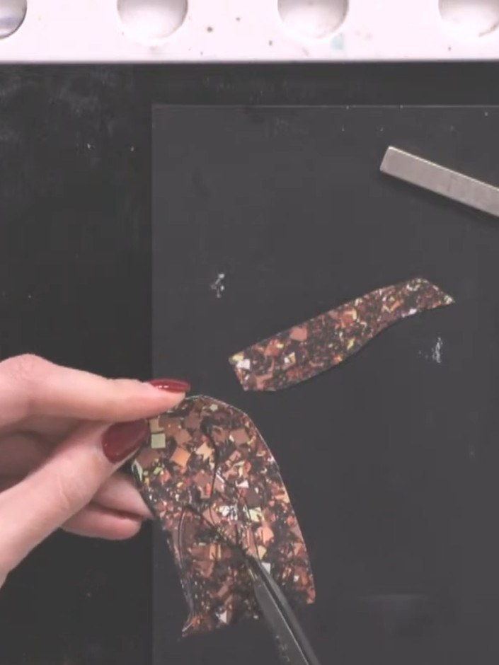 Step 3: Using small scissors, carefully cut out just the dress portion of the stamped lady image, following the outlin