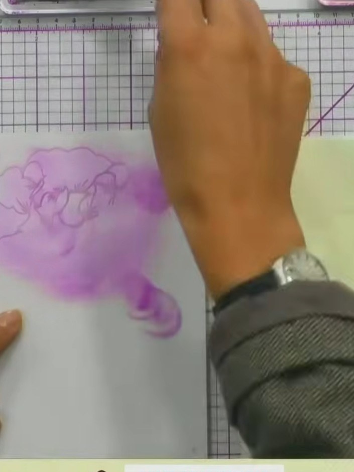 Step 2: Apply pink or red ink through the stencil using a light touch and circular motions. Work the colour gently to 