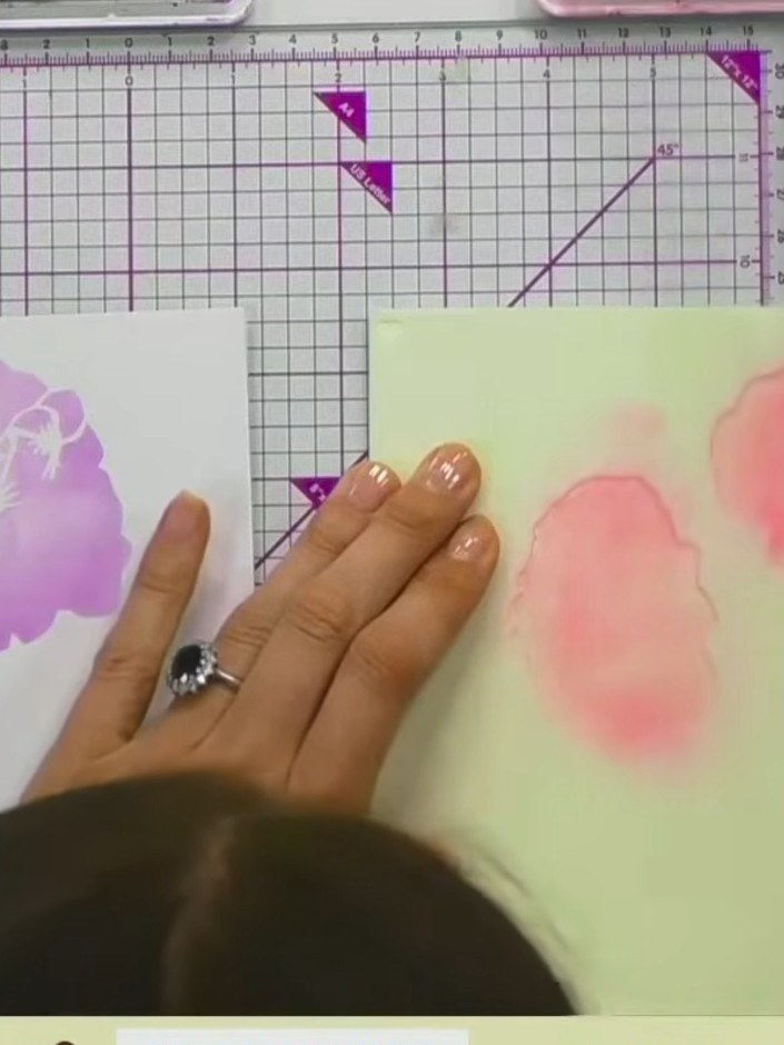 Step 5: Use stencil 3 to add green ink for the foliage and leaves. Apply the ink through the stencil using a blending 
