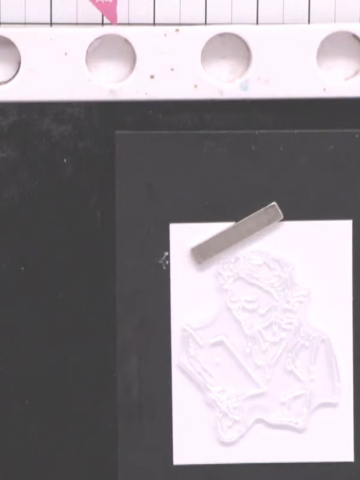 Step 4: Select small floral die-cut embellishments from your kit collection. Choose pieces that will complement your l