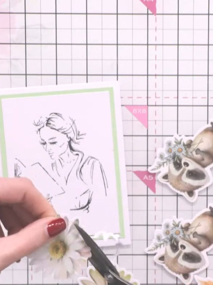Step 8: Select a sentiment stamp and position it on the card to complete your design. The decorative elements includin