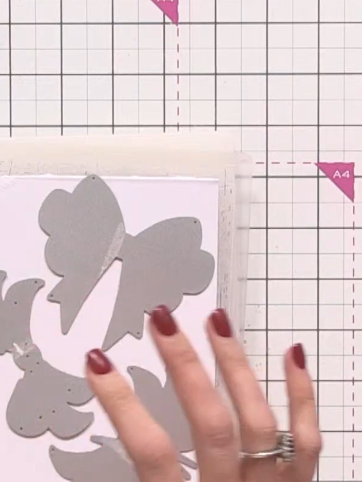 Step 2: Cut out the small centre piece from the die-cut bow shape. This creates the shadow detail that will add dimens