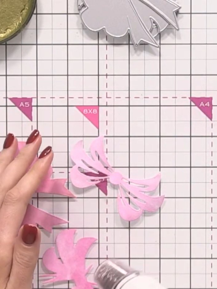 Step 7: Allow all the pink butterfly and bow pieces to dry completely before proceeding to the next step.