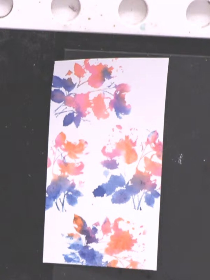 Step 5: Using a sticky ink pad with gold embossing ink, stamp the detailed portion of the lamination stamp over the dr