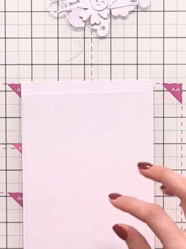 Step 5: Take your white card base and layer it with a white matted panel to create a clean, layered foundation for you
