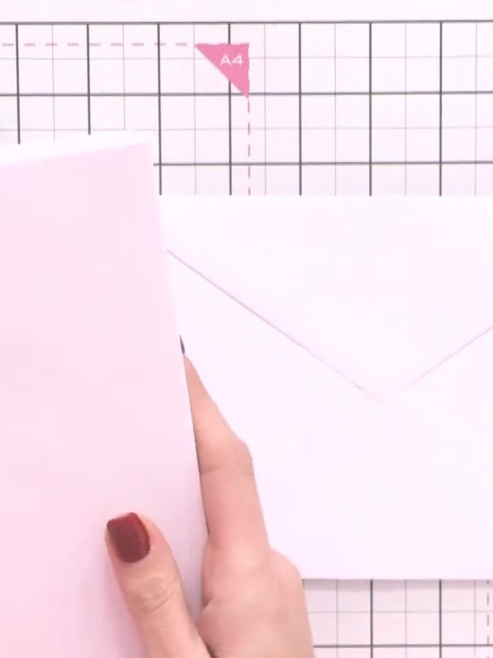 Step 1: Take two envelopes and apply adhesive tape to the flap of one envelope.
