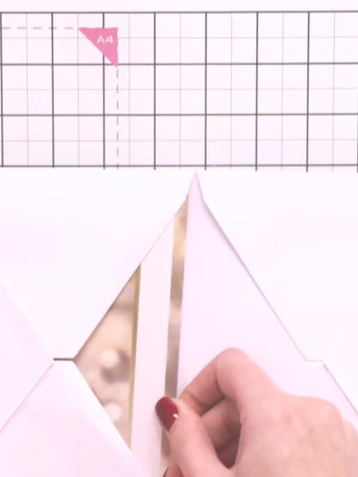 Step 5: Select a topper from the card kit and punch a circle in the centre using a circle punch.