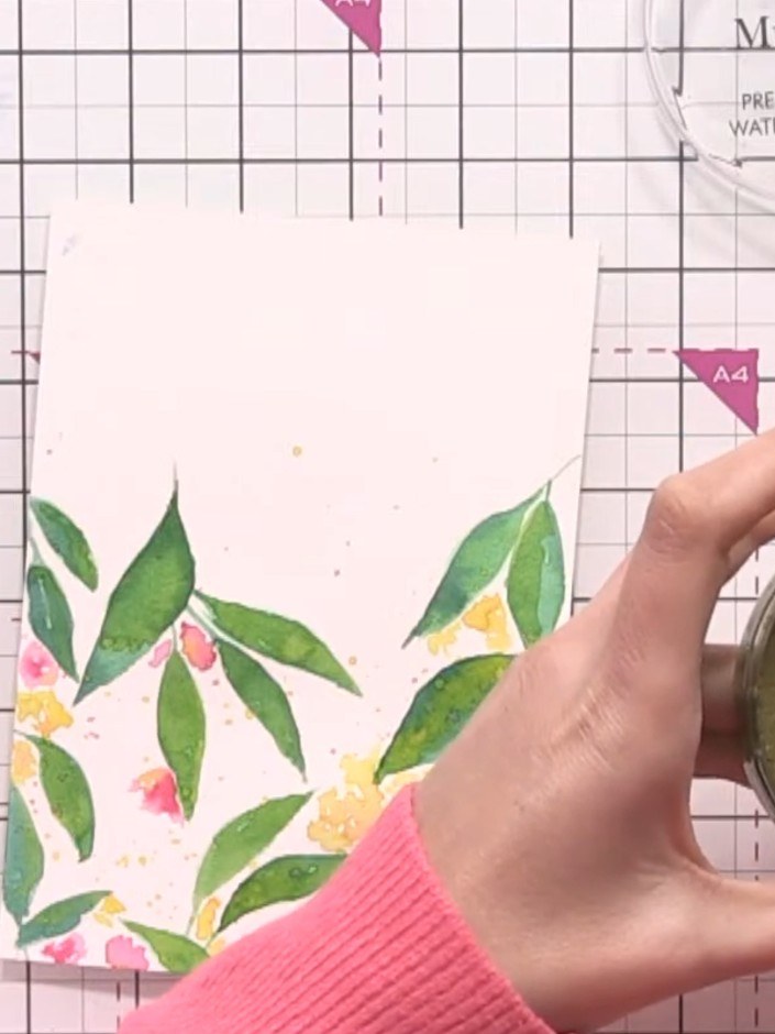 Step 10: Using a fine brush and gold ink, add delicate detailing to selected leaves. Outline the edges of some leaves a