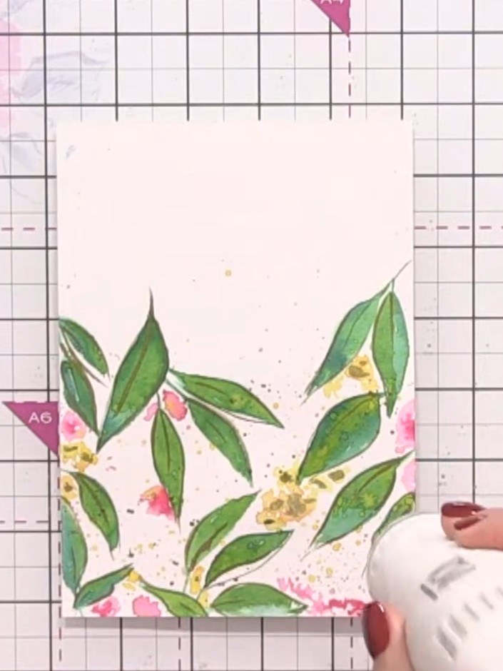 Step 11: Mount your painted panel onto a white card blank using double-sided tape or adhesive. Position the panel centr