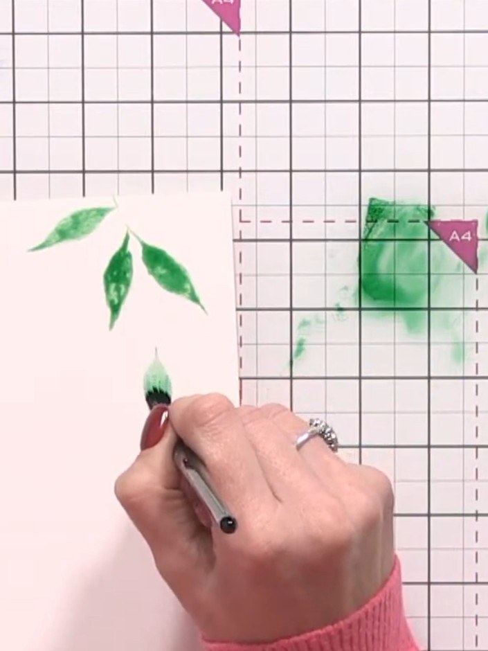 Step 5: Keep your painted leaf areas wet by adding clean water with your brush as needed. This allows the green colour