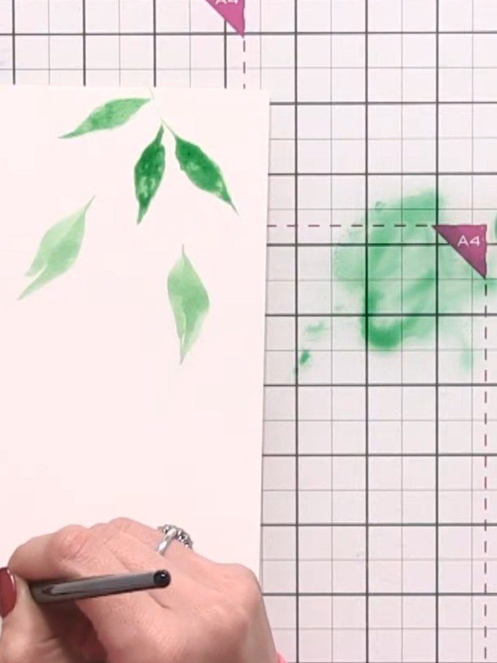 Step 6: While the paint is still wet, drop additional green colours into the wet areas of your leaves to add depth and