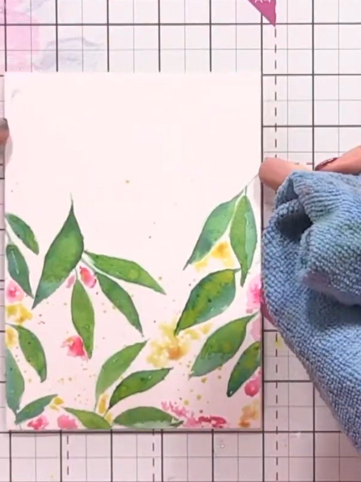 Step 9: Dry your painted panel thoroughly with a heat gun to set the watercolours. Hold the heat gun over the panel, m