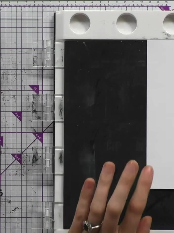 Step 2: Lightly spray the inked stamp with water from a spray bottle to create a watercolour effect.
