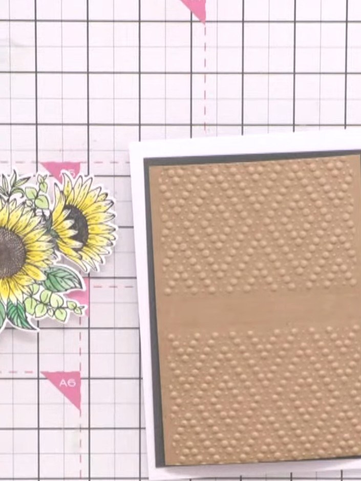 Step 3: Mount the embossed kraft panel onto your card base, positioning it as a decorative border element on the right