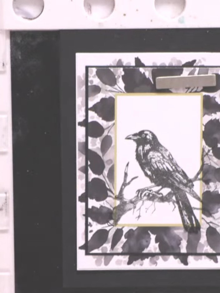 Step 4: Die-cut or blade out the centre of a coordinating patterned paper to create a frame window. Position this fram