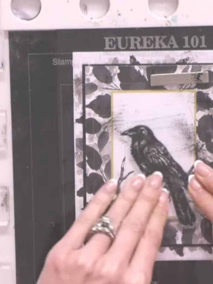Step 5: Layer foam pads on the back of the black frame piece. Position and adhere the frame over the stamped bird pane