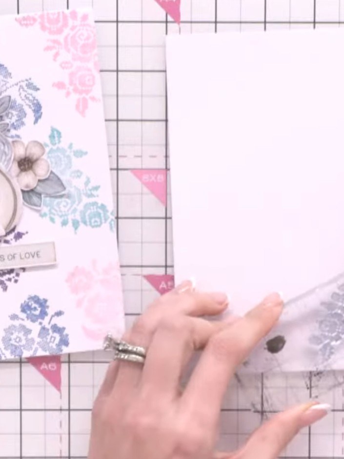 Step 1: Ink up the floral stamp with teal ink. Stamp it randomly across white card to create background texture, stepp