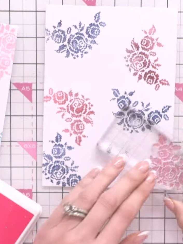 Step 3: Blend the teal and pink inks together using your finger to create an ombre effect with no harsh lines between 