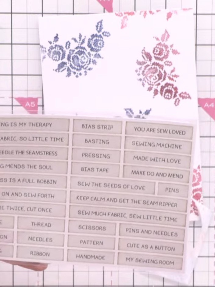 Step 9: Select a sentiment stamp from the collection, such as 'Sew on and so forth', and stamp it at the bottom corner