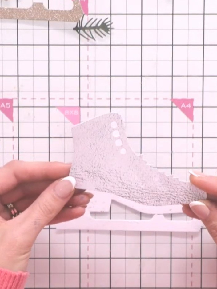 Step 2: Die-cut the main boot shape from the tan or black leather-effect paper included in the kit.