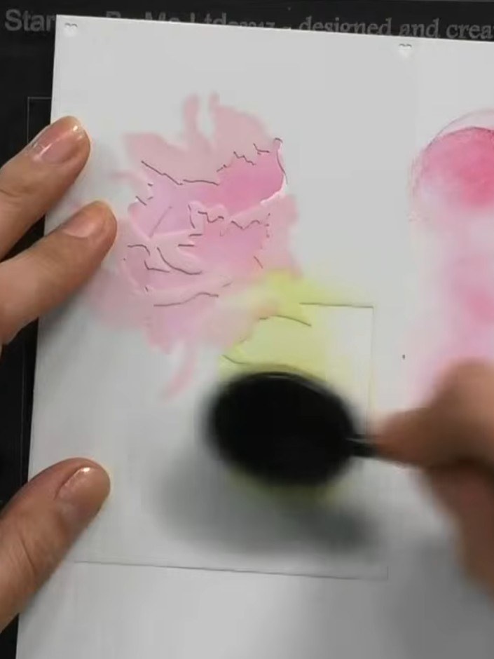 Step 4: Apply green ink through the stencil to create the leaf details on your card. Use a blending brush in circular 