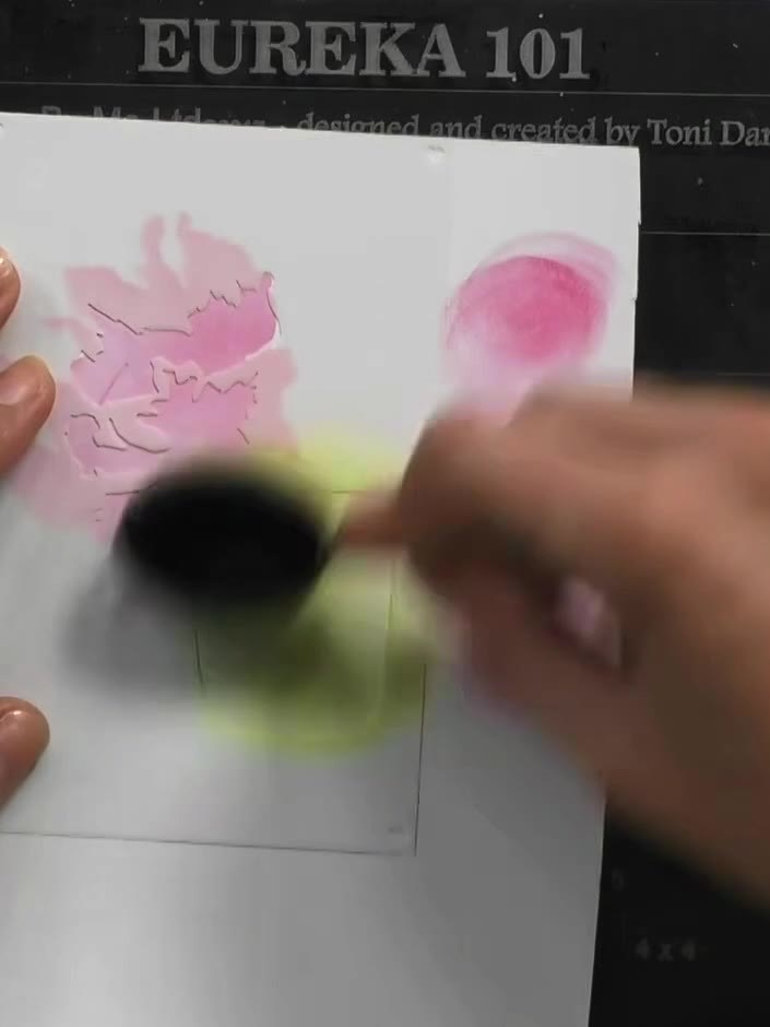 Step 5: Stamp the floral design in black ink onto the white card, carefully lining up the stamp with the stencilled pi