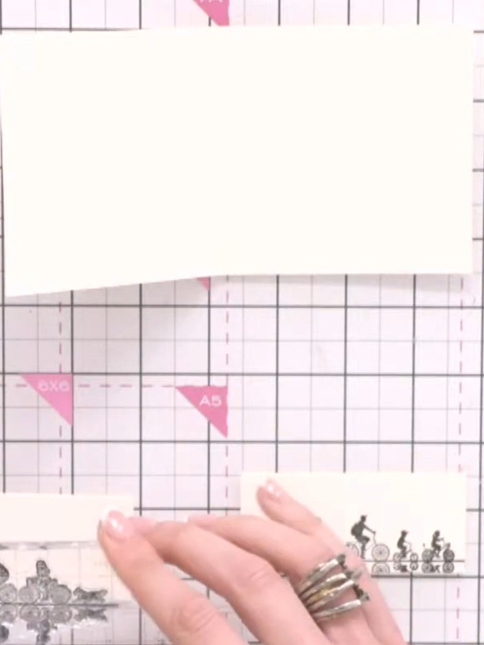 Step 7: Stamp the bike image repeatedly across the top of your cream card insert using black ink.