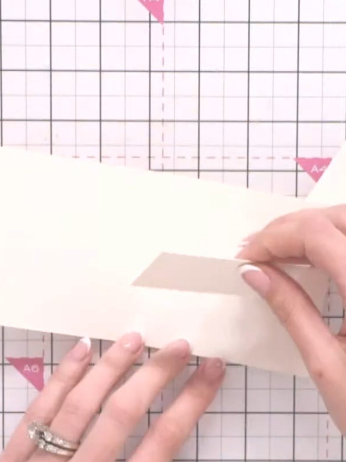 Step 1: Cut two pieces of cream card to pocket size, smaller than your gift box interior. These will be used to create