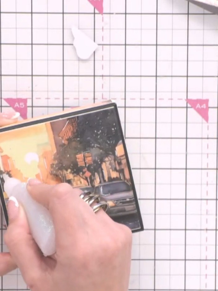 Step 10: Place the completed 3D card inside the decorated box with tissue paper to present as a gift.