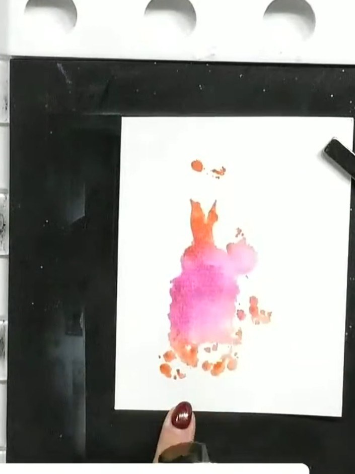 Step 2: Select two or more ink pad colours of your choice. Pink and orange work well together for this watercolour eff