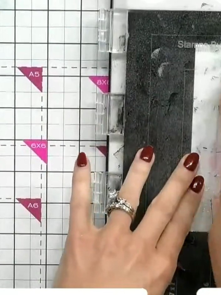 Step 7: Clean the stamp with a cloth to remove excess ink and allow it to dry before returning it to the carrier sheet