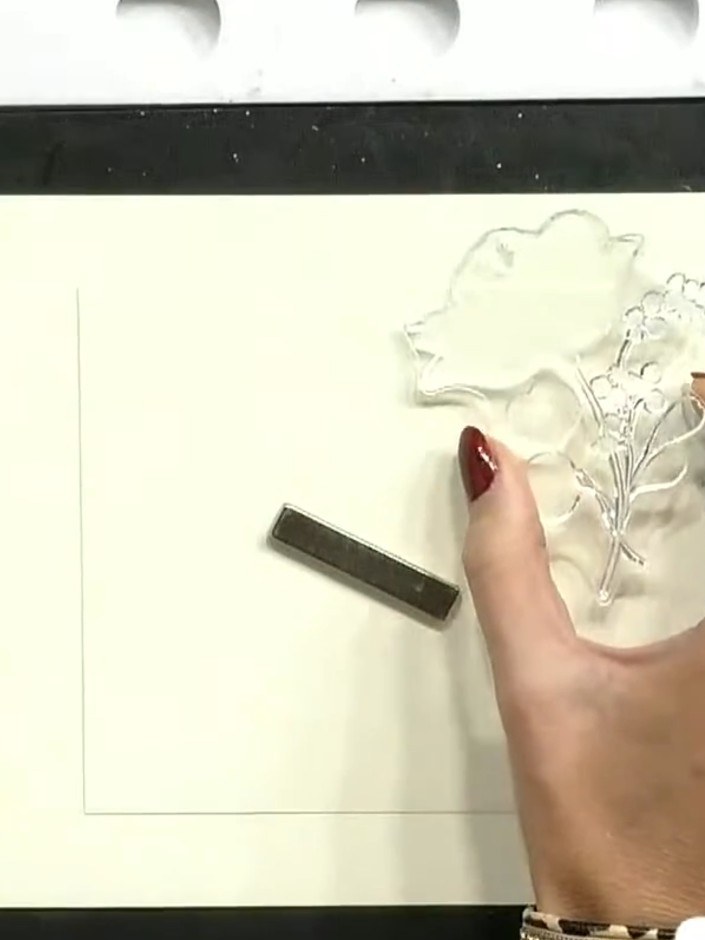 Step 2: Select the floral stamp and position it on your card blank. Choose two or three ink pad colours such as purple