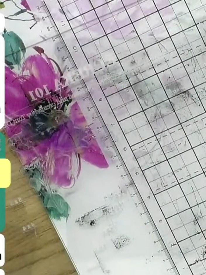 Step 4: Apply teal ink to the outer edges of the flower petals and leaves using an ink pad or blending tool. Work care