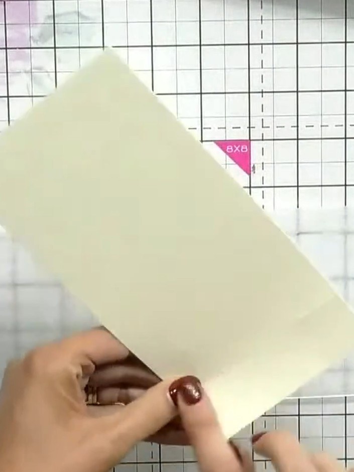 Step 1: Select a cream or white card stock and place it on your craft mat. Choose an embossing folder with a floral or