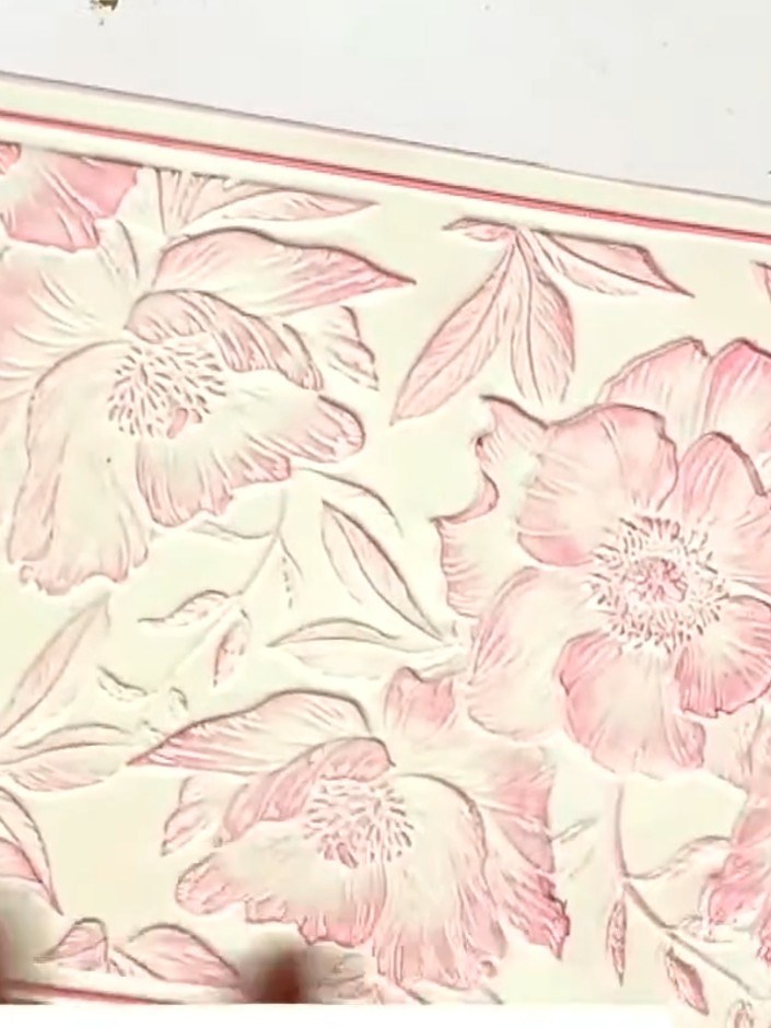 Step 8: Turn the card over to reveal the debossed (recessed) side of the embossed design. If desired, apply ink to thi