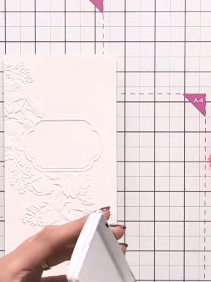 Step 2: Add colour to the flower petals using pink, orange and yellow ink pads with a brush. Apply the colour directly