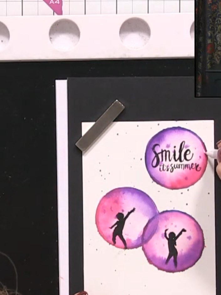 Step 13: Using a white gel pen, add highlights around the stamped silhouettes to create a halo bubble effect. Draw smal