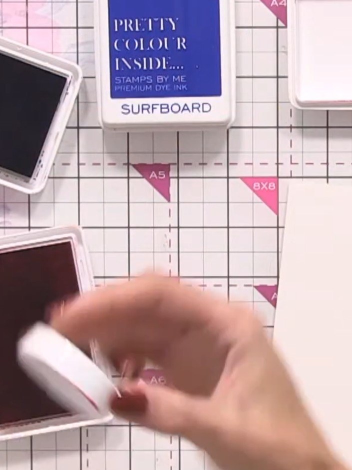 Step 3: Press the inked lid onto your watercolour card to transfer the circular ink pattern. Use a dabbing motion to e