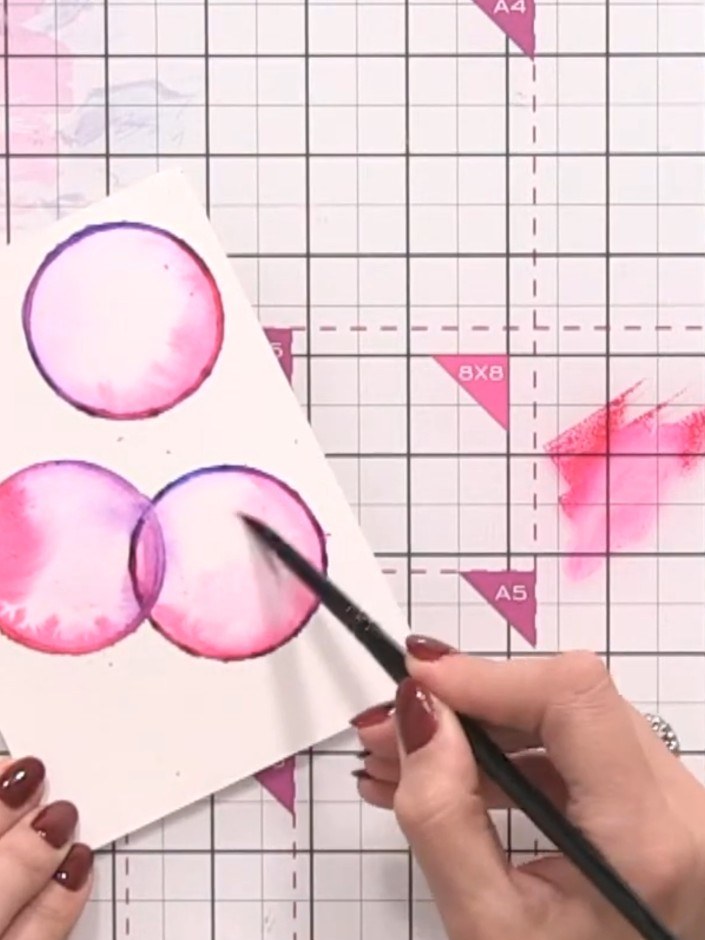 Step 9: Use a damp brush to blend and soften any harsh lines on the bubbles. Add more water if needed to create smooth