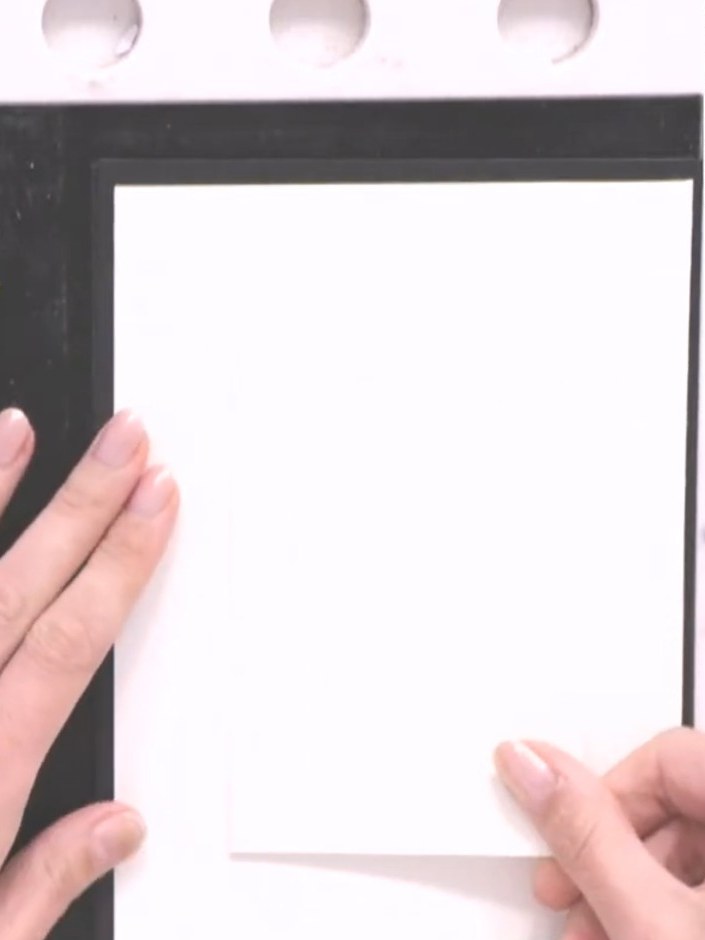 Step 1: Cut two pieces of A5 watercolour card. Position them side by side on your craft mat and join them in the centr