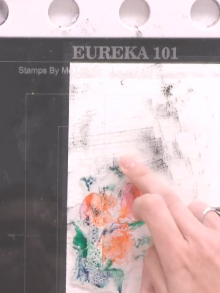 Step 4: Apply green and teal inks to the leaves and stems of your stamped design, covering all areas. Use an ink pad t