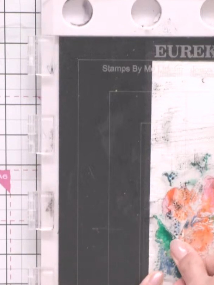 Step 6: Press the stamp firmly onto the card, ensuring the ink reaches into the fold crease. Lift the stamp away caref