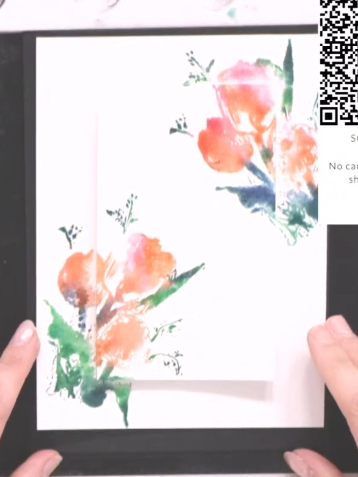 Step 8: Align the outline portion of the stamp over the dried watercoloured floral design. Stamp carefully in black in