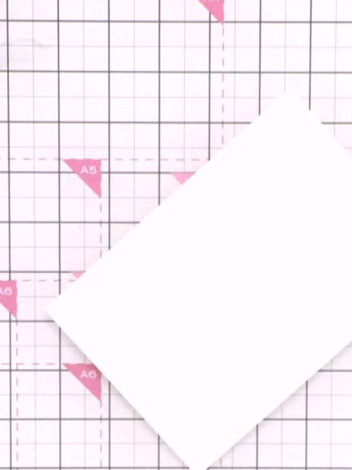 Step 1: Cut a piece of A5 watercolour card and position it textured side up on your craft mat.