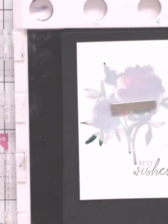 Step 10: Using a blending brush lightly loaded with pink ink, tap gently through the stencil to create a soft halo effe