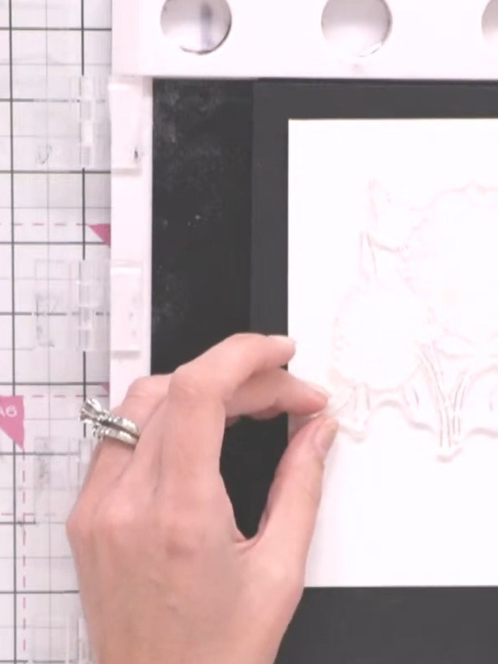 Step 2: Position a second piece of watercolour card beneath the first piece to create a fold line for your card base. 