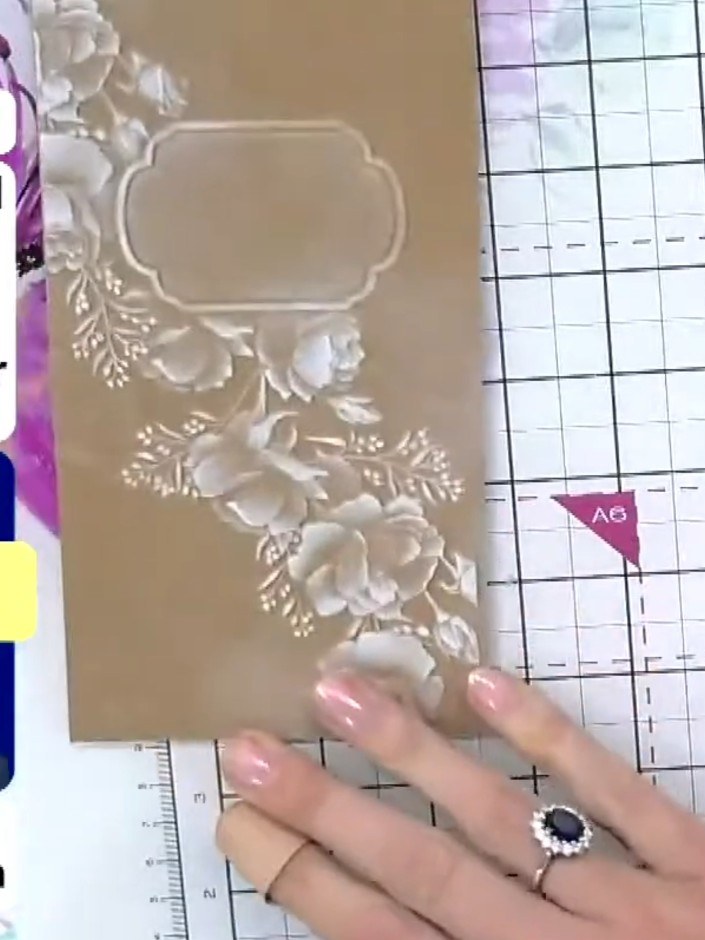 Step 2: Open the embossing folder and carefully remove your embossed card from inside.