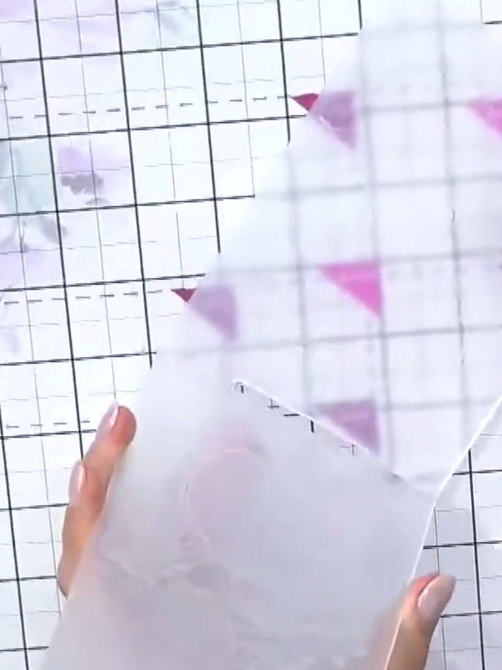 Step 3: Lightly spray the embossed folder with water using an ink pad or spray bottle to create a watercolour effect o